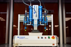 INT418 Fisnar robotic dispensing system image Ten reasons to invest in a dispensing robot