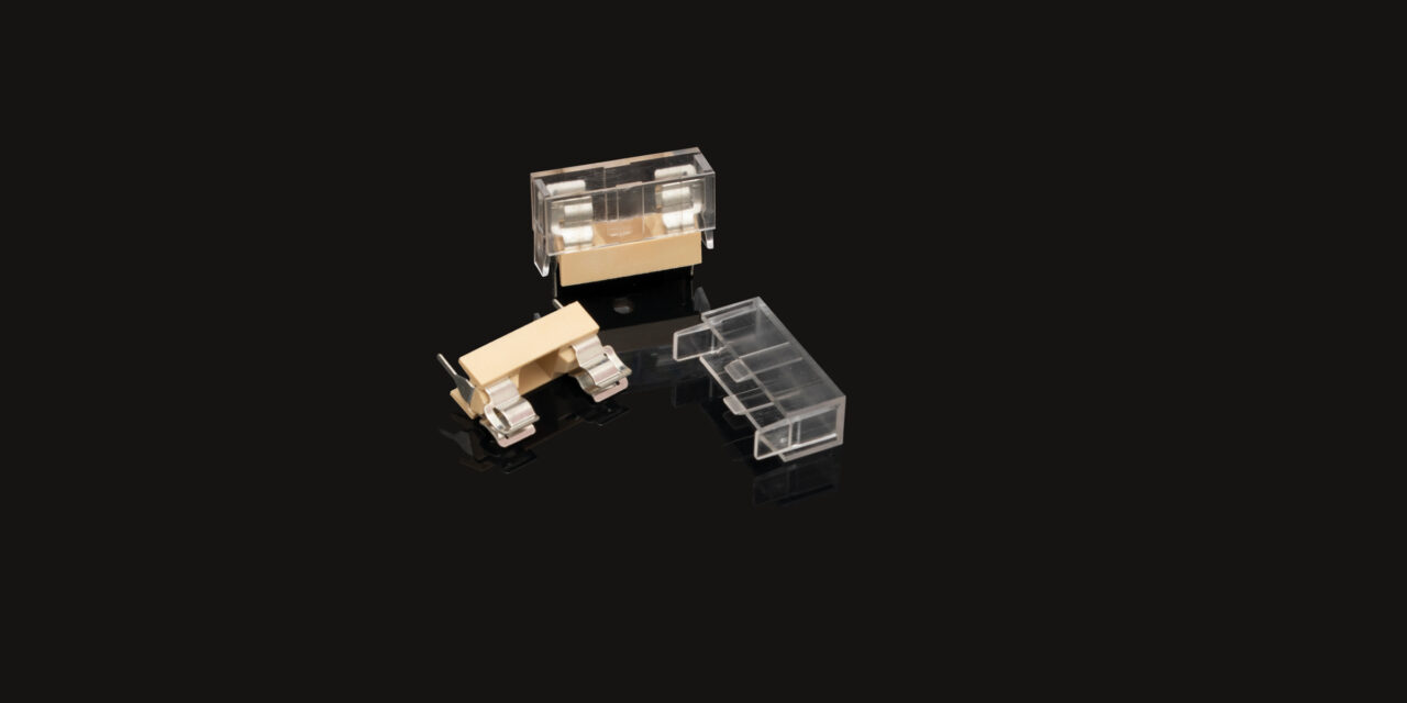 New DFH02 plastic PCB fuse holder with optional transparent insulation cover from Hylec for PCB and thru-hole mounting