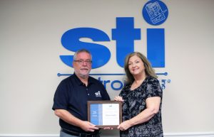 STI Electronics Dave Donna 24 STI Recognizes Donna Taylor’s 25-Year Anniversary